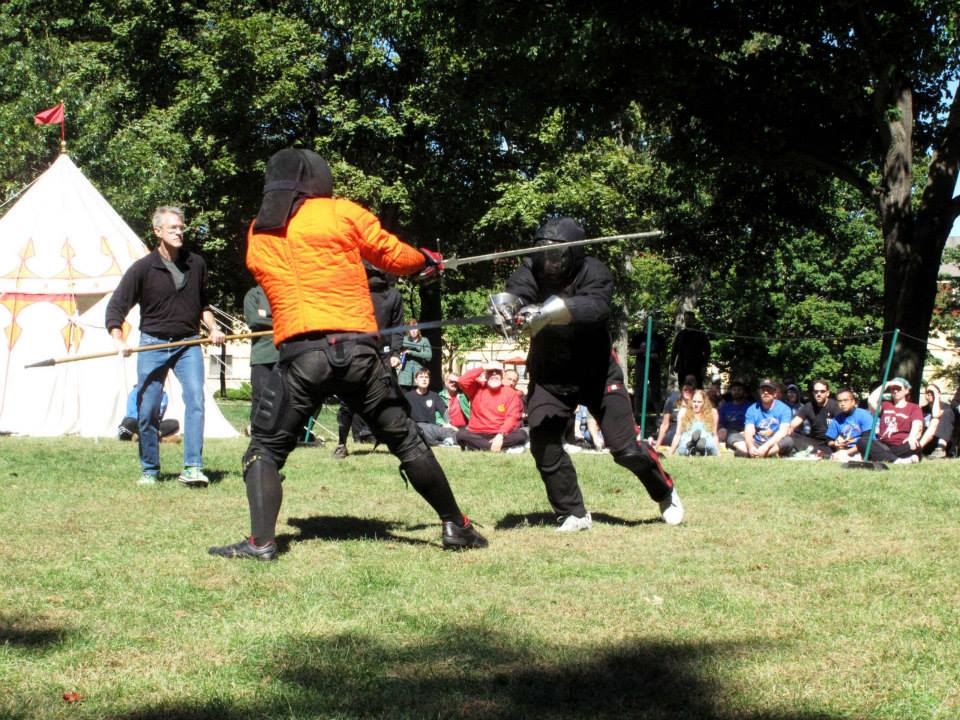 That's gotta hurt! A near-miss by Roland Cooper ends in his beheading by Mishael Lopes Cordoza during the longsword finals.